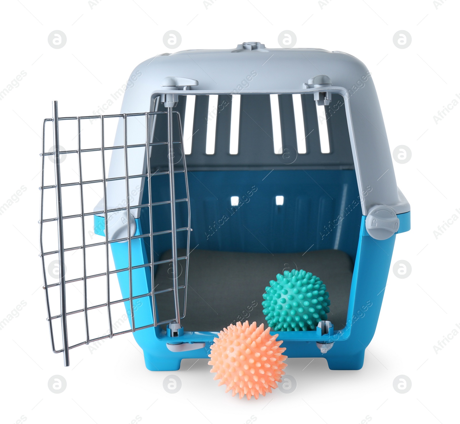 Photo of Light blue pet carrier with toys isolated on white