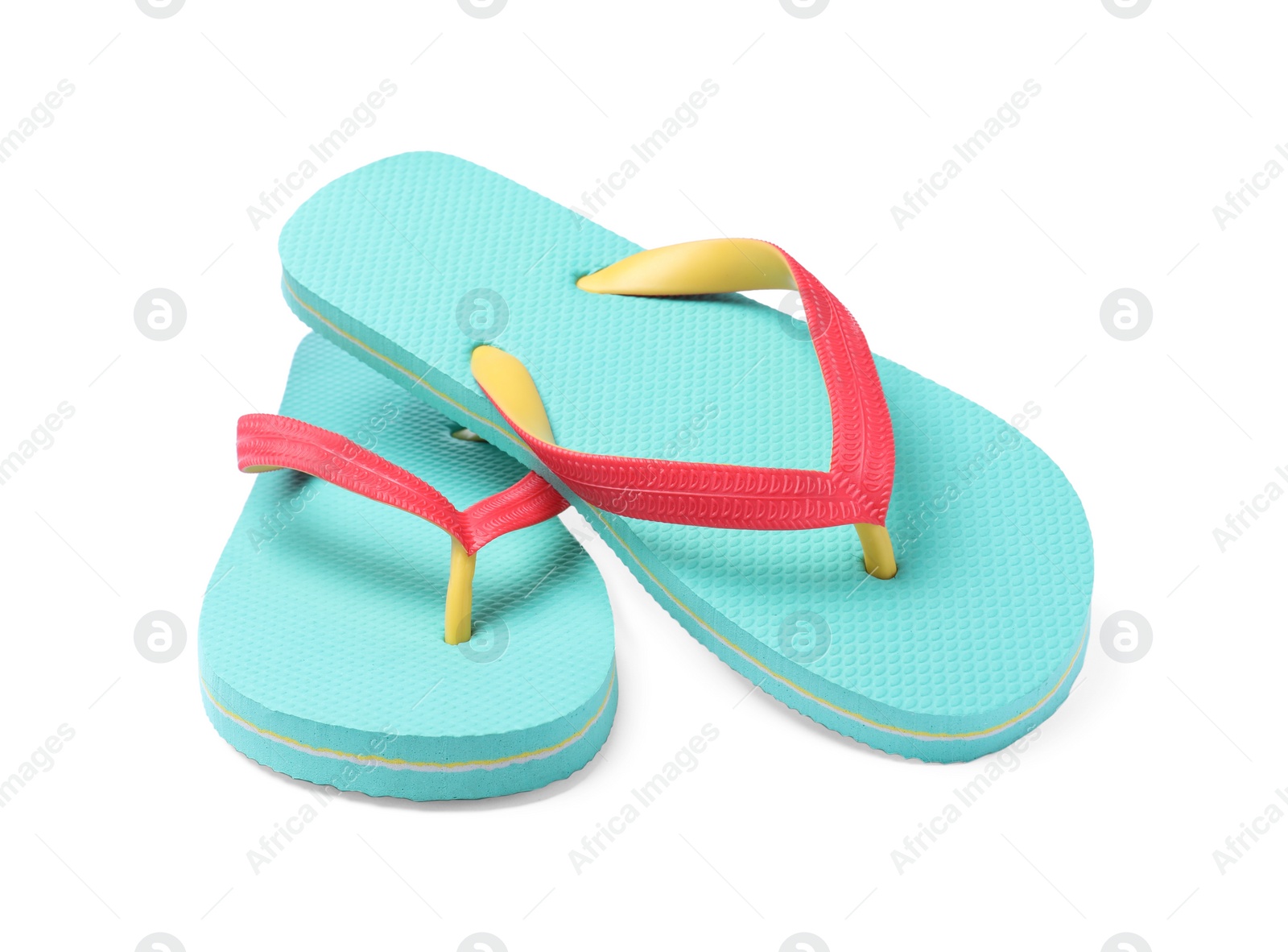 Photo of Pair of turquoise flip flops isolated on white