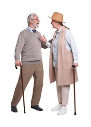 Photo of Senior man and woman with walking canes talking on white background