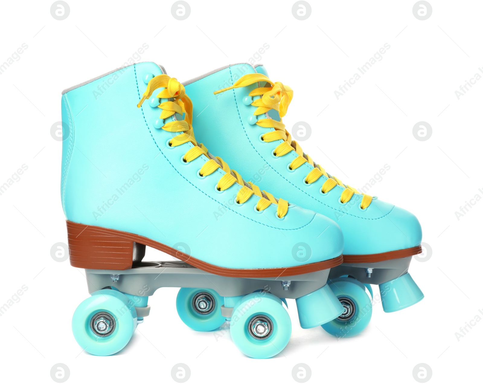 Photo of Pair of bright stylish roller skates on white background