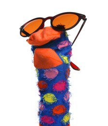 Photo of Funny sock puppet with sunglasses isolated on white
