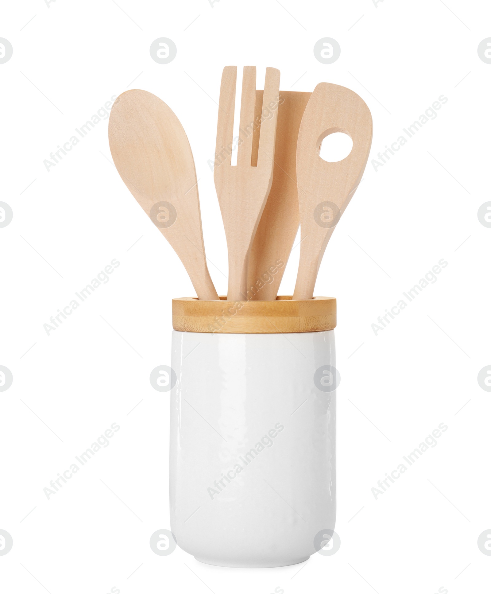 Photo of Set of wooden kitchen utensils in holder isolated on white