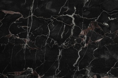 Photo of Black marble surface as background, closeup view