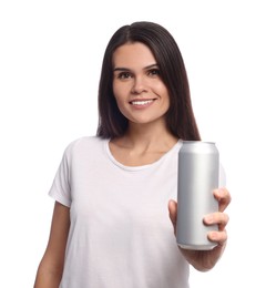 Beautiful young woman holding tin can with beverage on white background