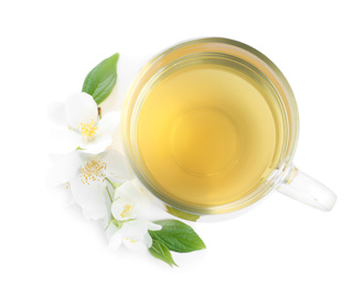 Photo of Cup of tea and fresh jasmine flowers isolated on white, top view