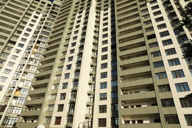 KYIV, UKRAINE - MAY 21, 2019: Beautiful view of modern housing estate in Pecherskyi district on sunny day, low angle