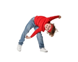 Photo of Happy little boy dancing on white background