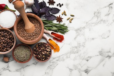 Photo of Flat lay composition with mortar and different spices on white marble table, space for text