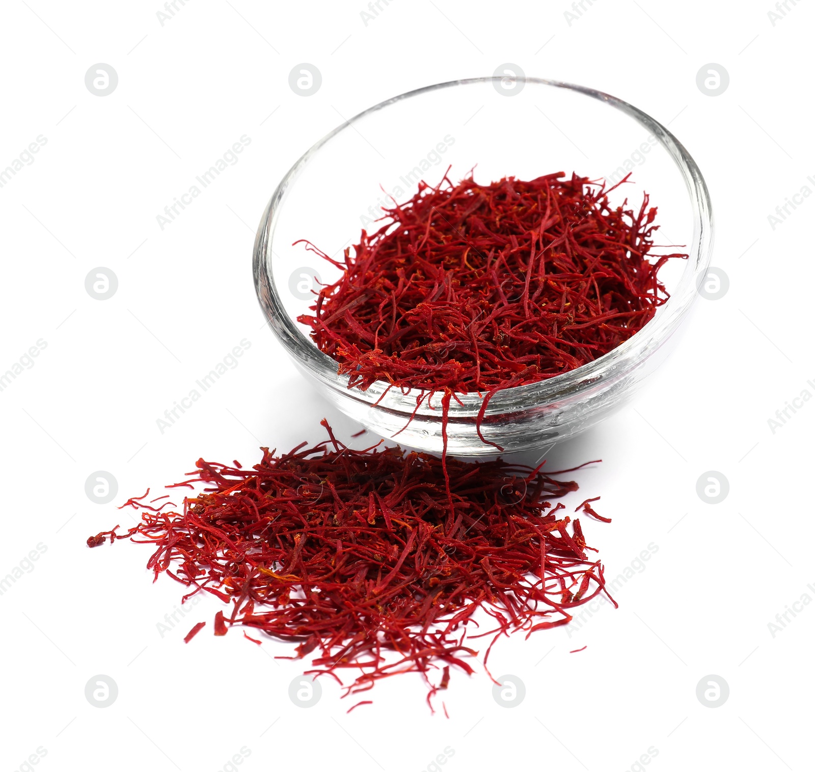 Photo of Aromatic saffron and bowl isolated on white