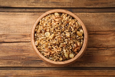 Traditional Christmas slavic dish kutia on wooden table, top view