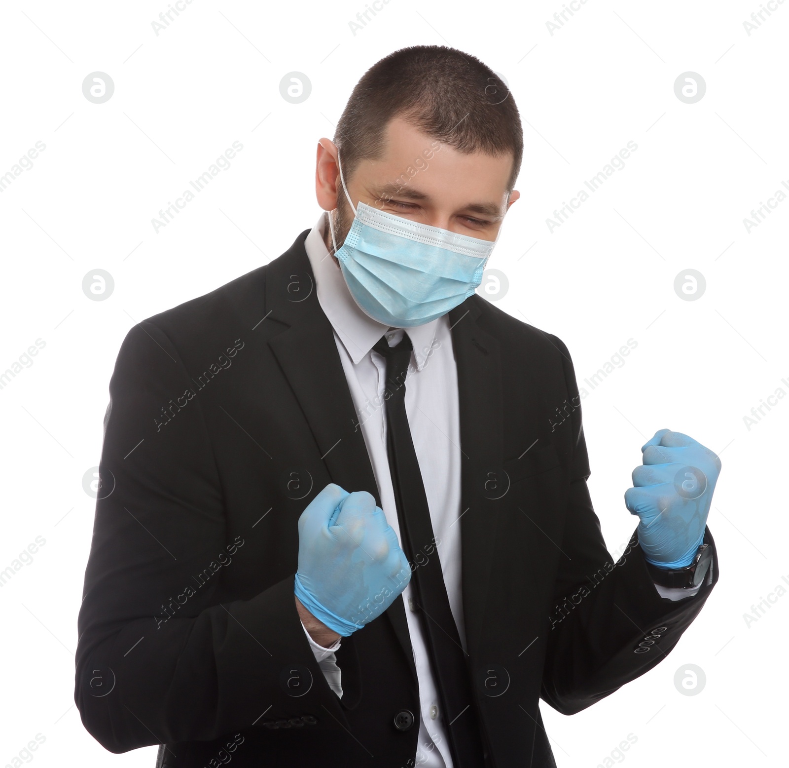 Photo of Emotional businessman with protective mask and gloves on white background. Strong immunity concept