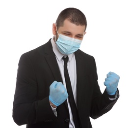Photo of Emotional businessman with protective mask and gloves on white background. Strong immunity concept