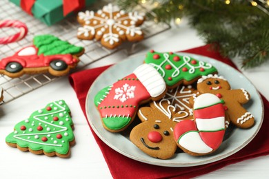 Photo of Tasty homemade Christmas cookies on white wooden table
