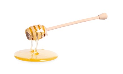 Photo of Natural honey dripping from dipper on white background