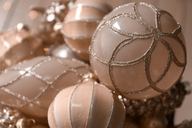 Photo of Collection of beautiful Christmas tree baubles on blurred background, closeup