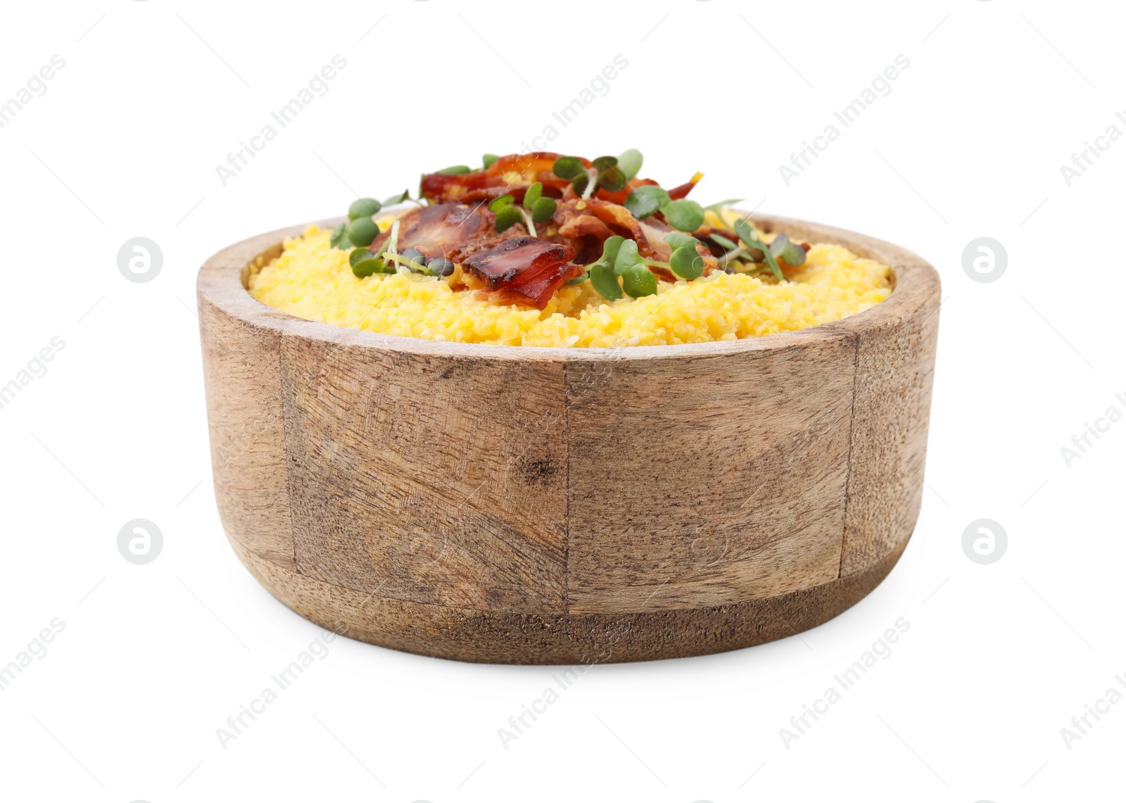 Photo of Cooked cornmeal with bacon and microgreens in wooden bowl isolated on white