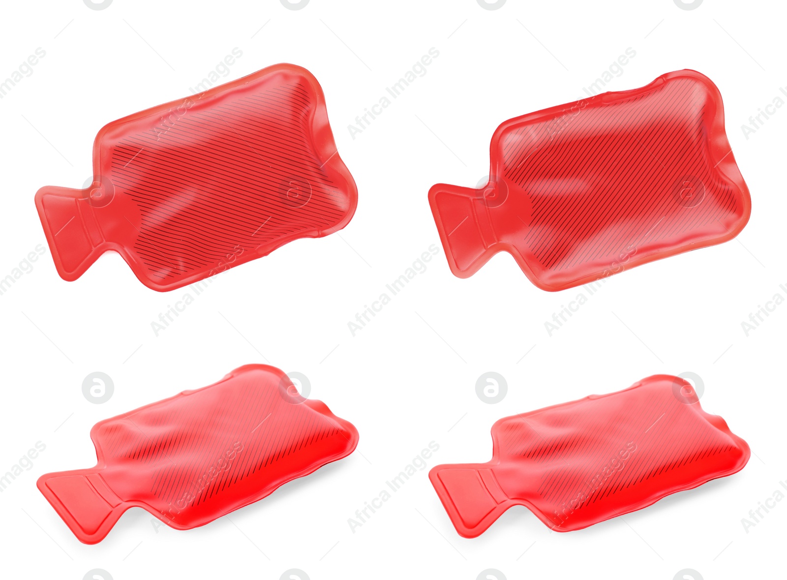 Image of Set with red rubber hot water bottles on white background