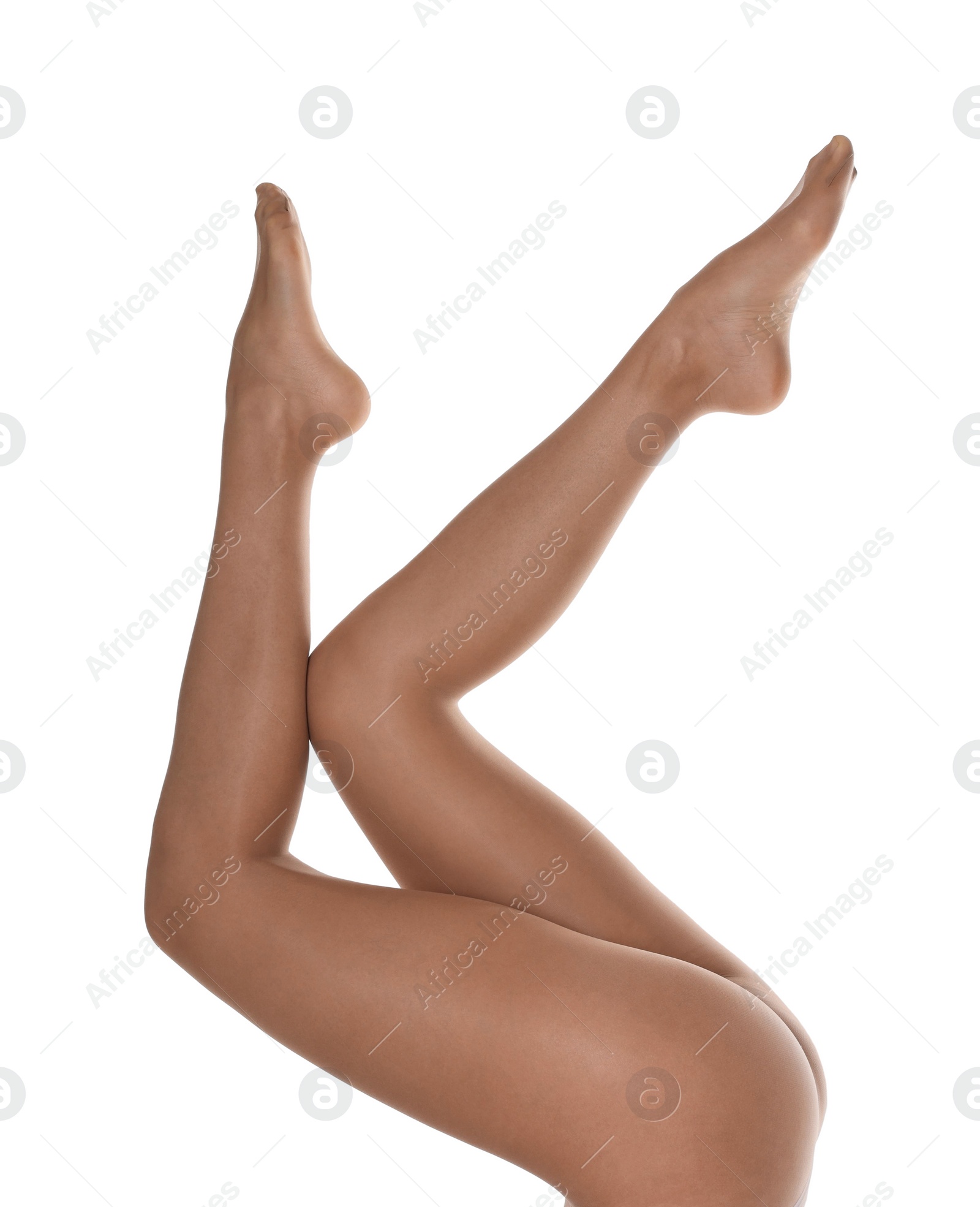 Photo of Woman with beautiful long legs wearing tights on white background, closeup