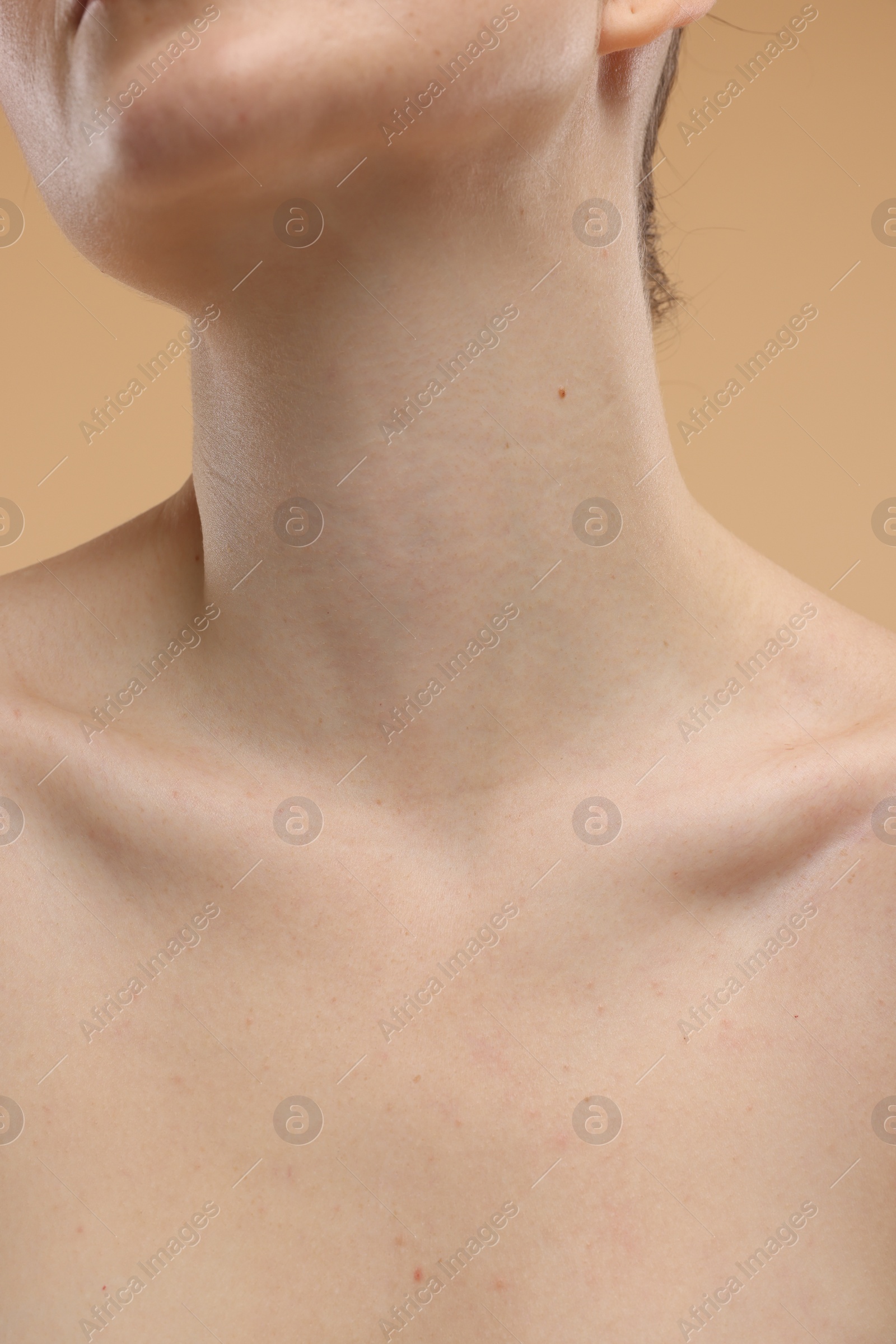 Photo of Beauty concept. Woman on beige background, closeup