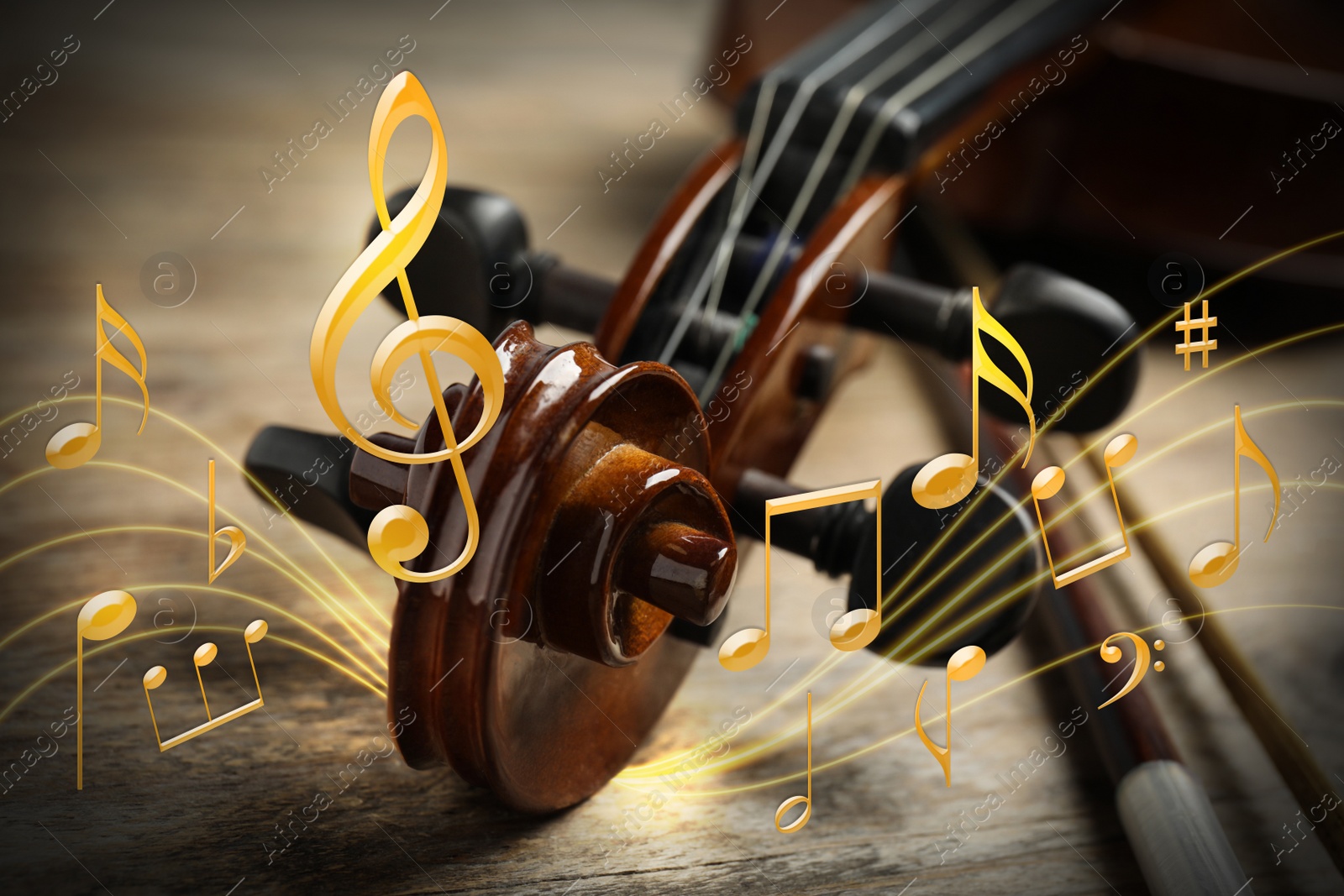 Image of Staff with music notes and symbols flowing through violin head on wooden background, closeup