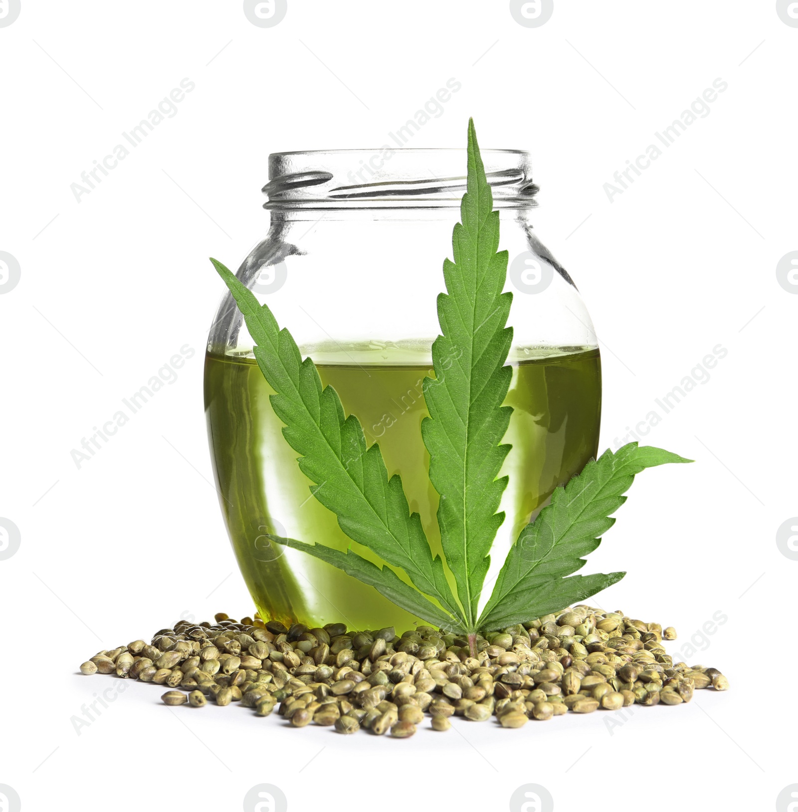 Photo of Jar with hemp oil, leaf and seeds on white background