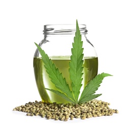 Photo of Jar with hemp oil, leaf and seeds on white background