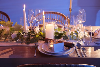 Festive table setting with beautiful tableware and decor indoors