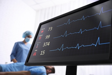 Photo of Cardiogram and data on display of heart rate monitor in clinic