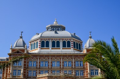 Exterior of beautiful building against blue sky
