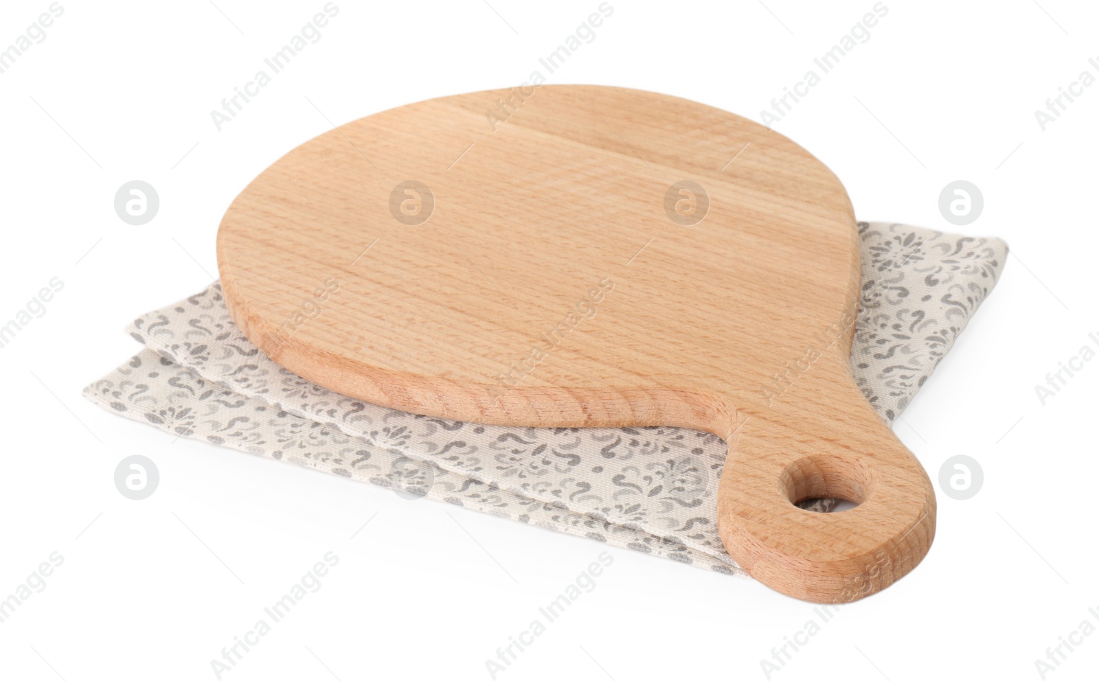 Photo of Wooden cutting board and napkin isolated on white