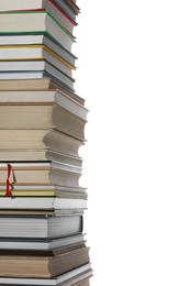 High stack of many different books isolated on white