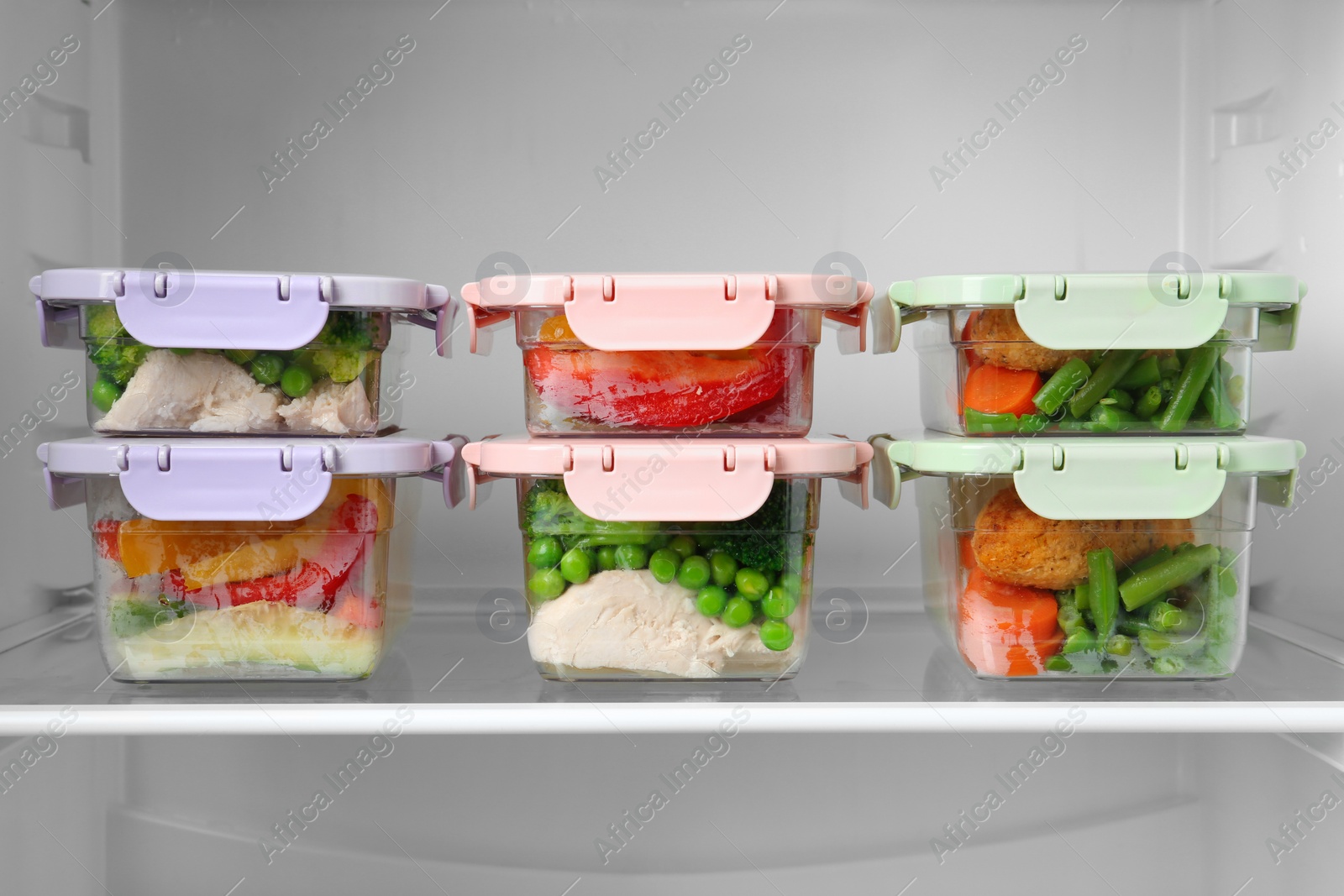 Photo of Boxes with prepared meals inside of refrigerator