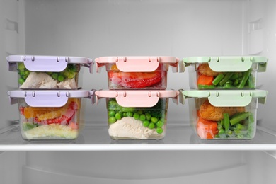Photo of Boxes with prepared meals inside of refrigerator