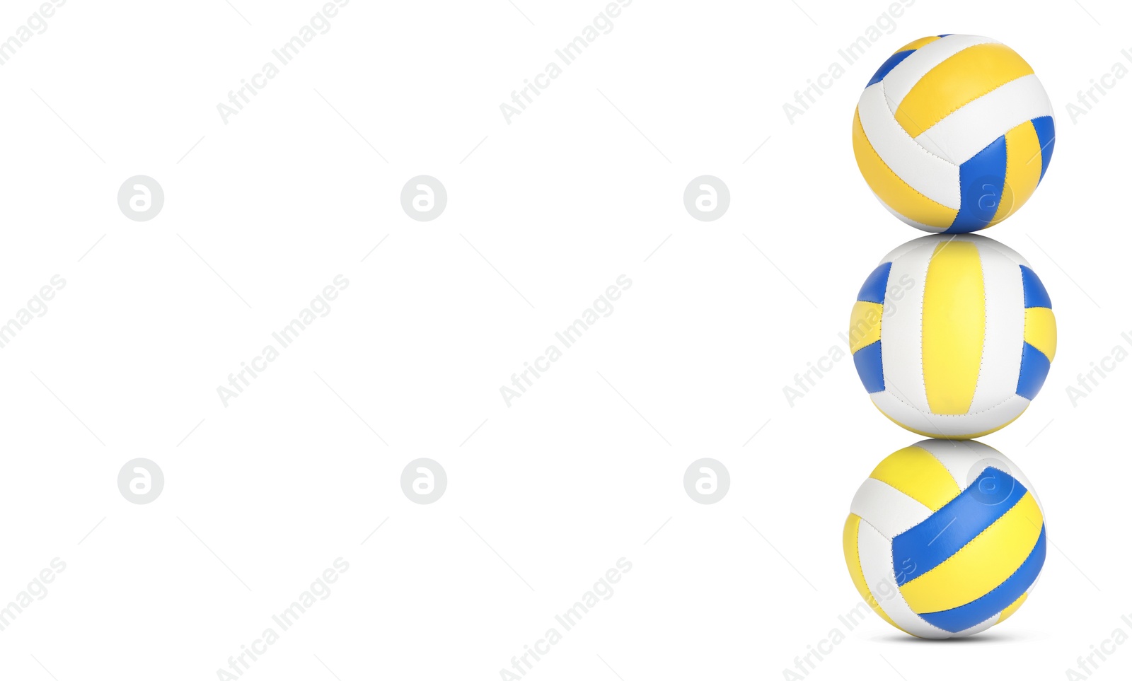 Image of Stack of volleyball balls on white background. Space for text