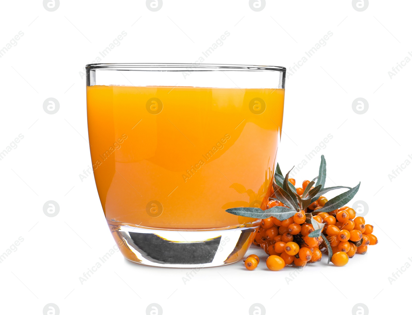 Photo of Delicious sea buckthorn juice and fresh berries isolated on white