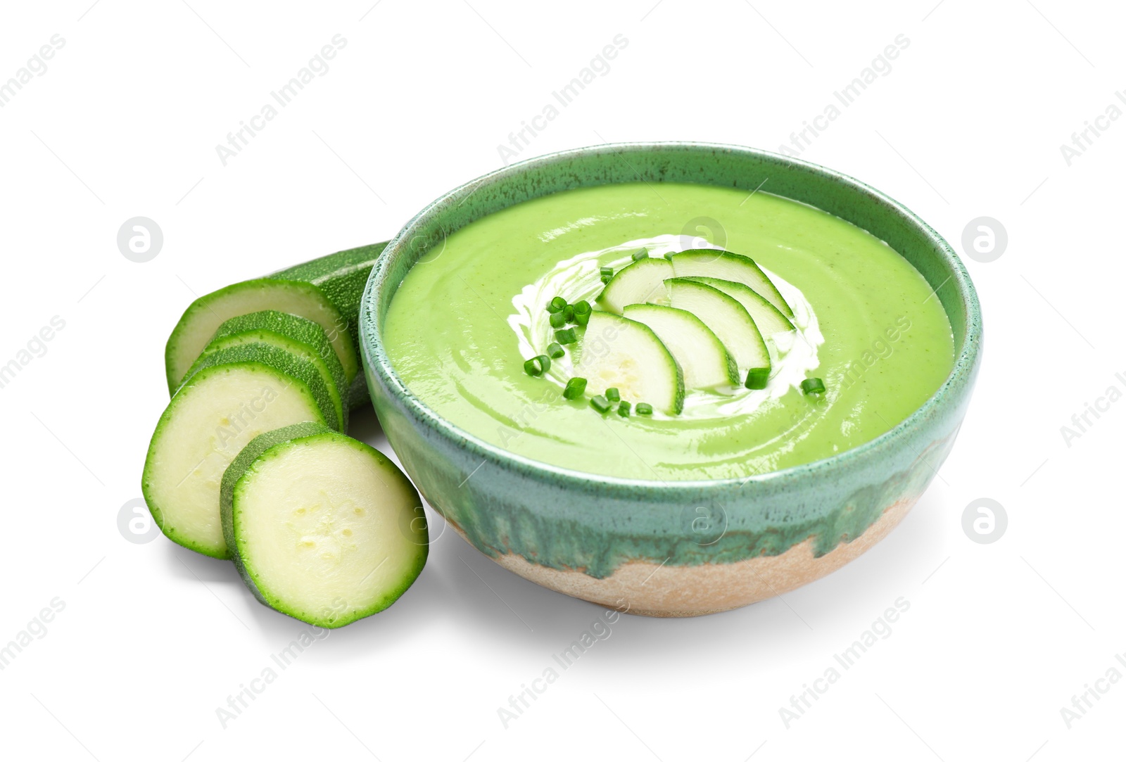 Photo of Tasty homemade zucchini cream soup isolated on white