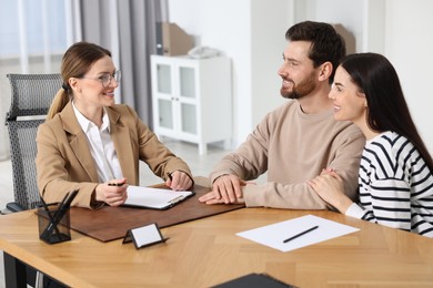 Couple having meeting with lawyer in office