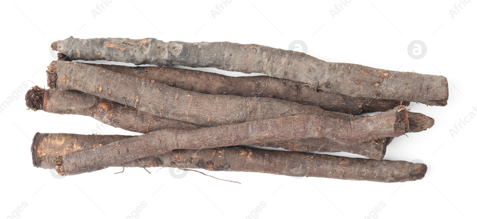 Photo of Raw salsify roots on white background, top view