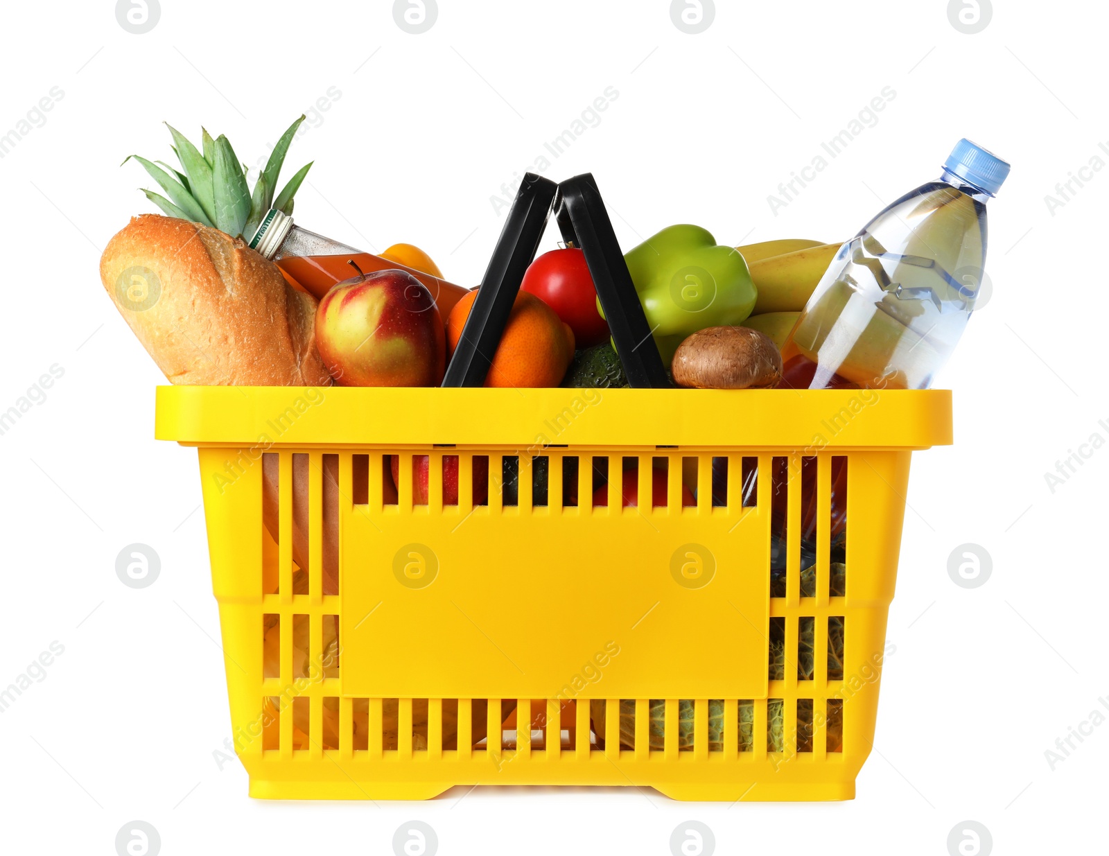 Photo of Shopping basket with grocery products on white background