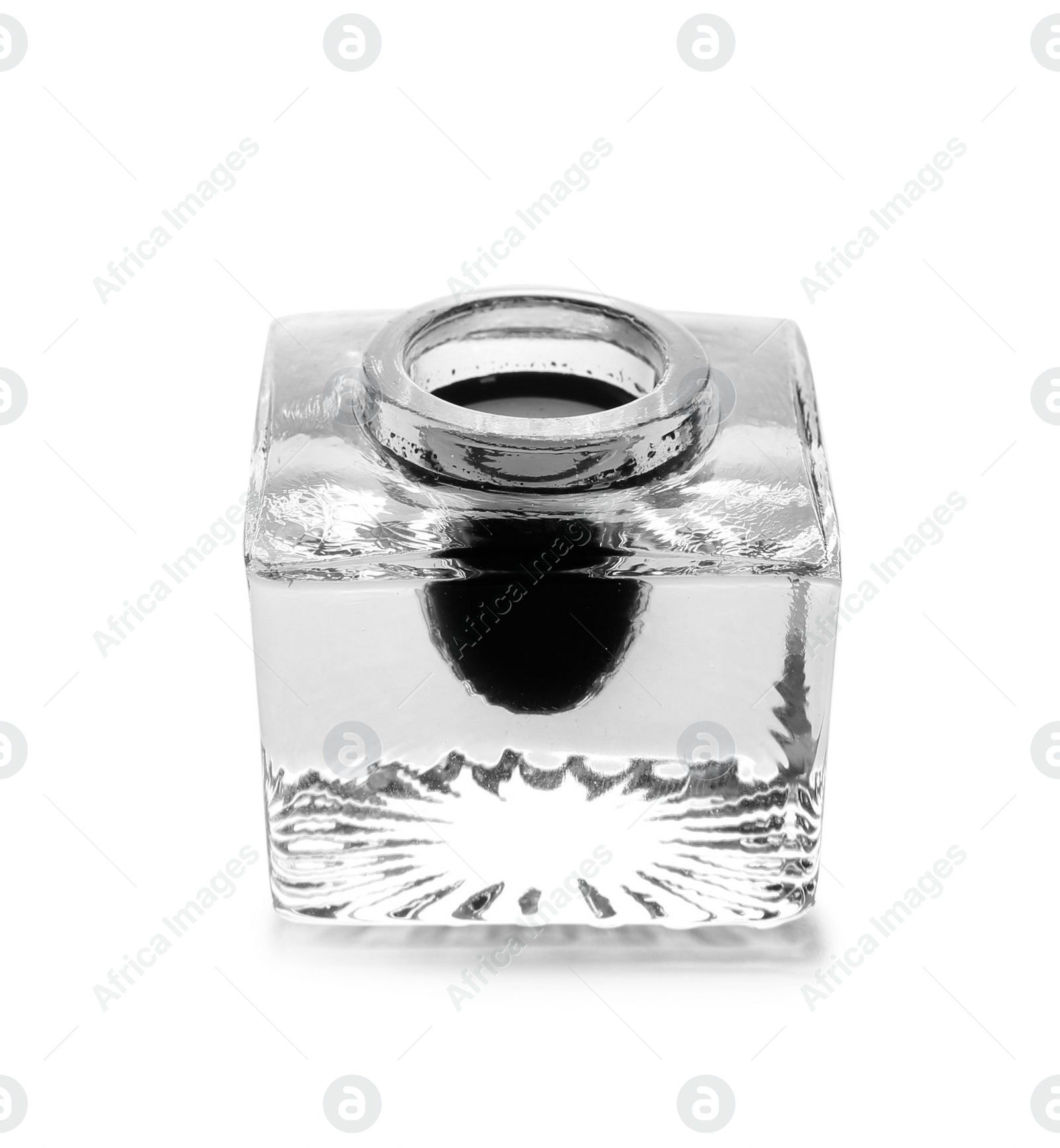 Photo of Glass inkwell on white background. Writing accessory