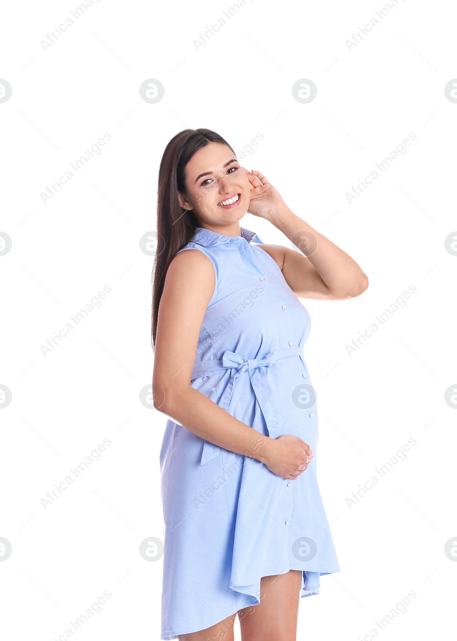 Photo of Beautiful pregnant young woman on white background