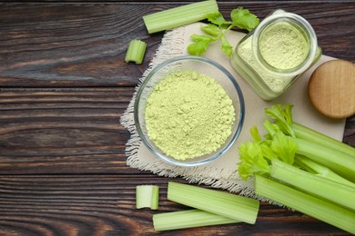 Natural celery powder and fresh stalks on wooden table, flat lay. Space for text