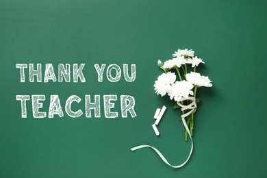 Phrase Thank You Teacher, beautiful flowers and chalk on green chalkboard, flat lay