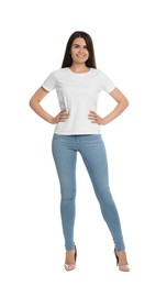 Happy woman wearing stylish light blue jeans and high heels shoes on white background