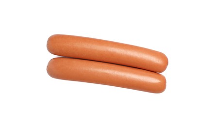 Fresh raw sausages isolated on white, top view. Ingredients for hot dogs