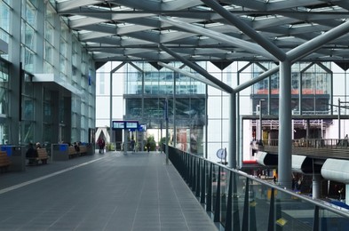 Photo of Railway station with waiting room under overhang