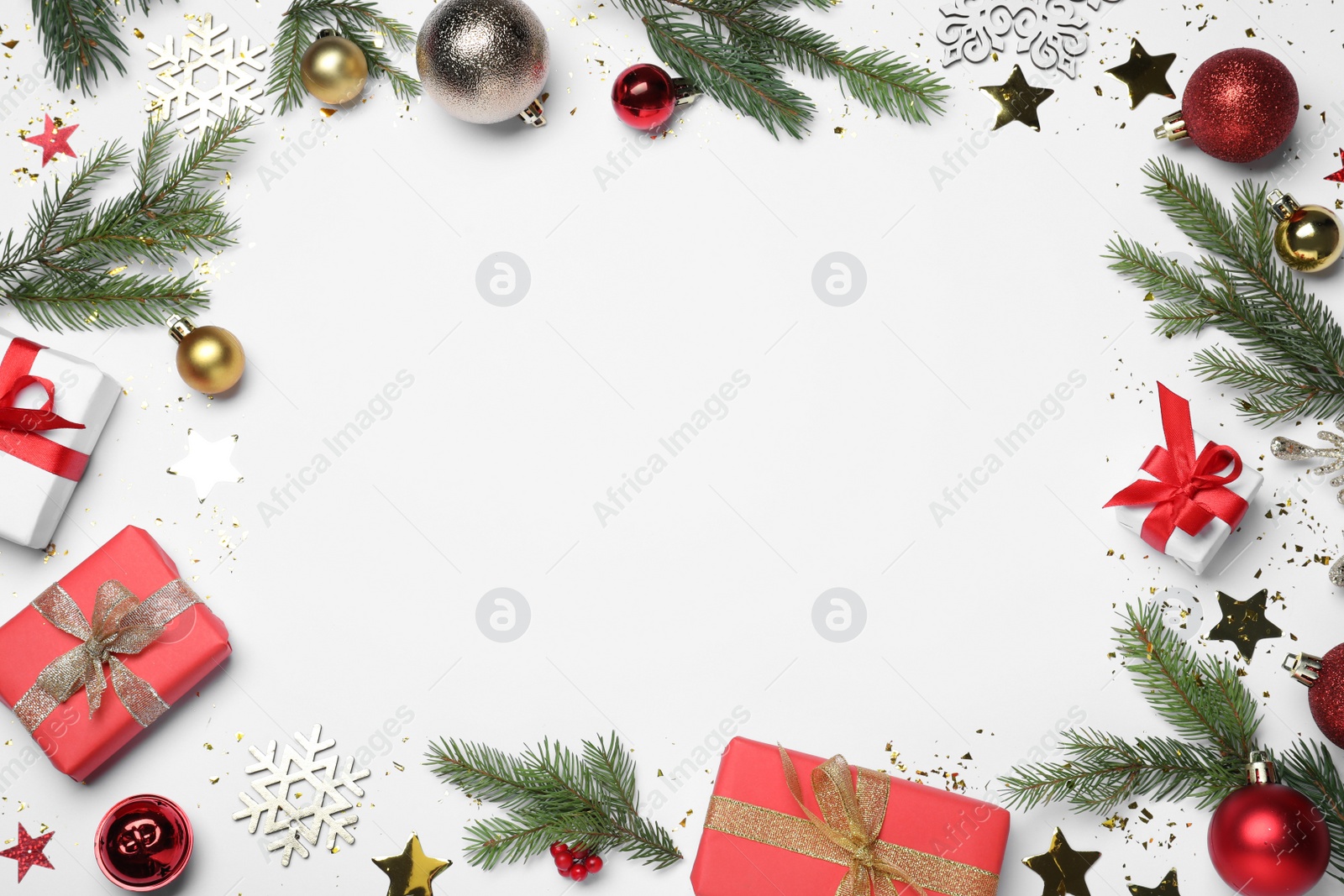 Photo of Frame of gift boxes and festive decor on white background, flat lay with space for text. Happy New Year