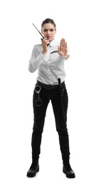 Photo of Female security guard using portable radio transmitter on white background