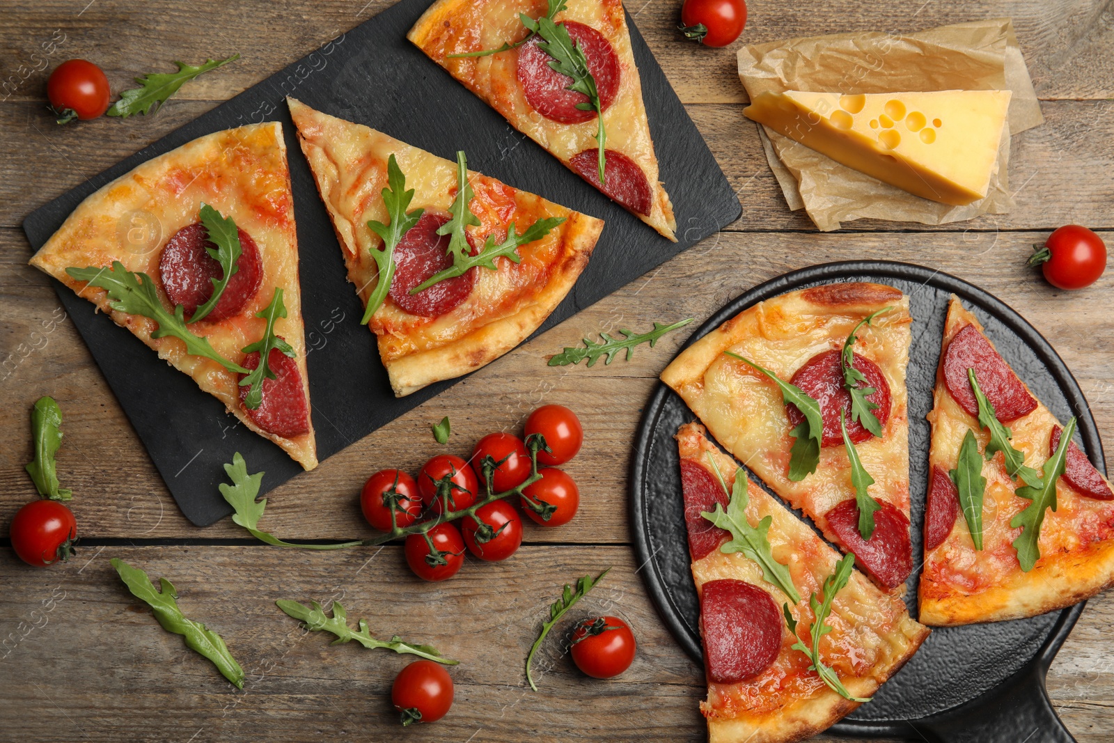 Photo of Flat lay composition with tasty pepperoni pizza on wooden table