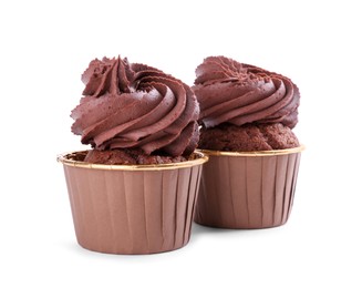 Photo of Two delicious chocolate cupcakes isolated on white